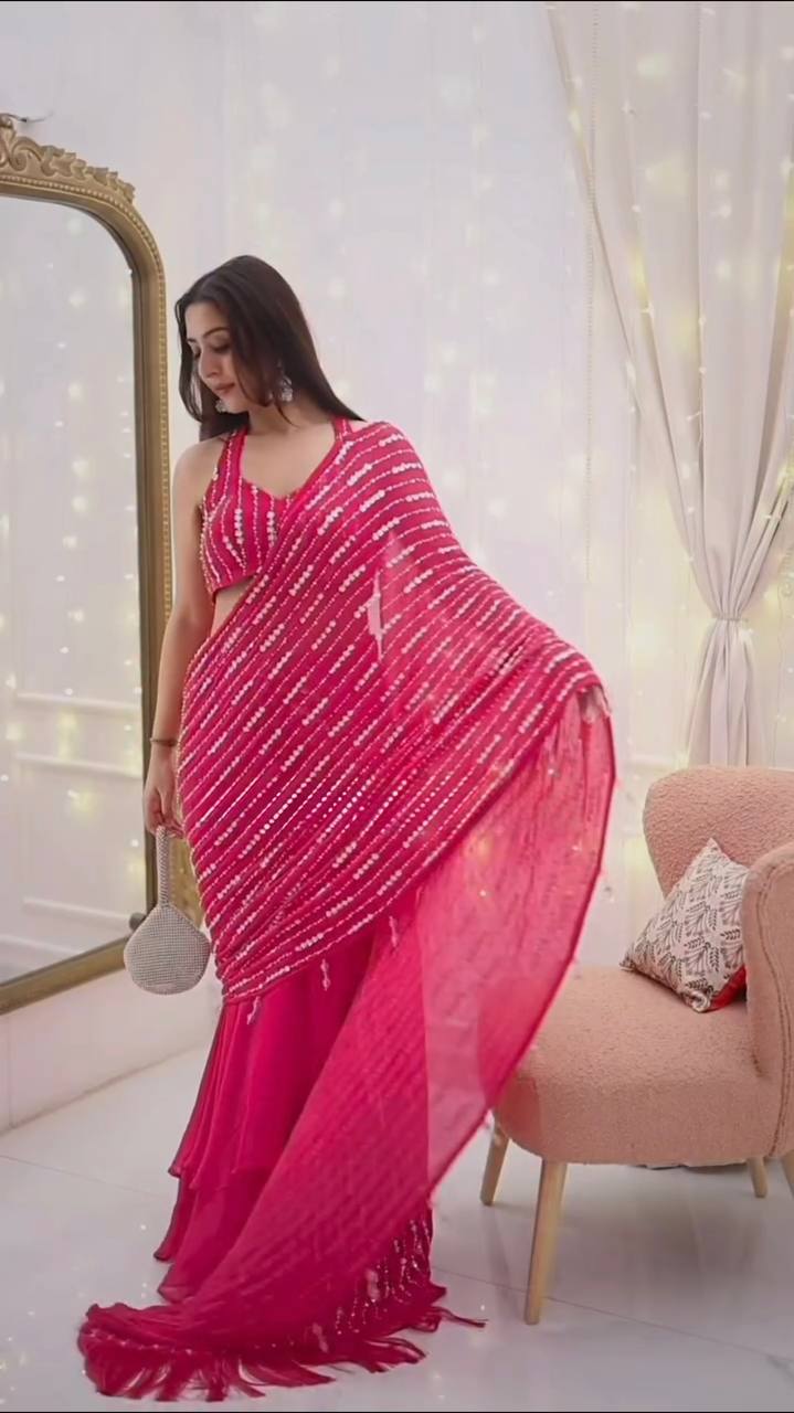 Radiant Rani Pink Silk Lehenga Choli Adorned with Opulent Heritage Floral Motifs and Intricate Zari Borders